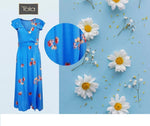 Light blue, long dress with daisy flowers.