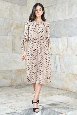 Beige dress with small polka dots